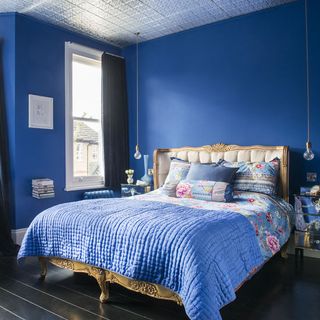 bedroom with royal blue wall