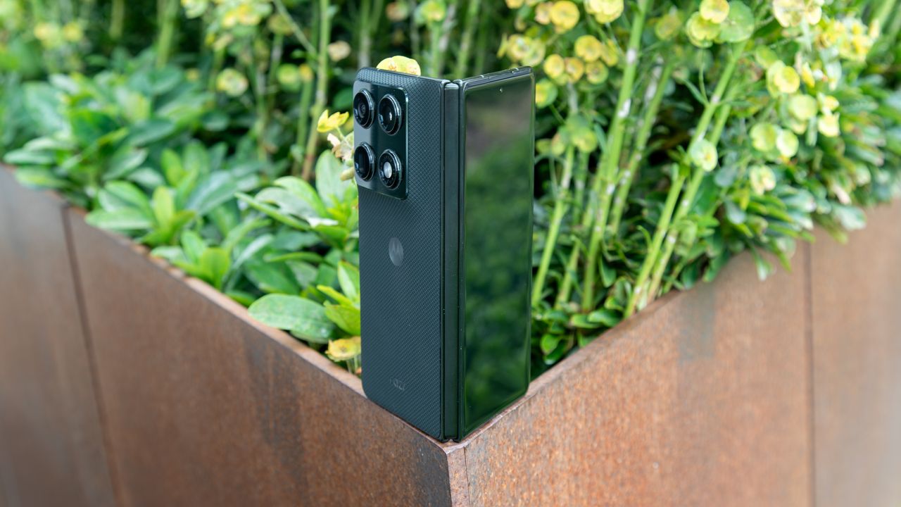 Motorola Razr Fold on the corner of a planter