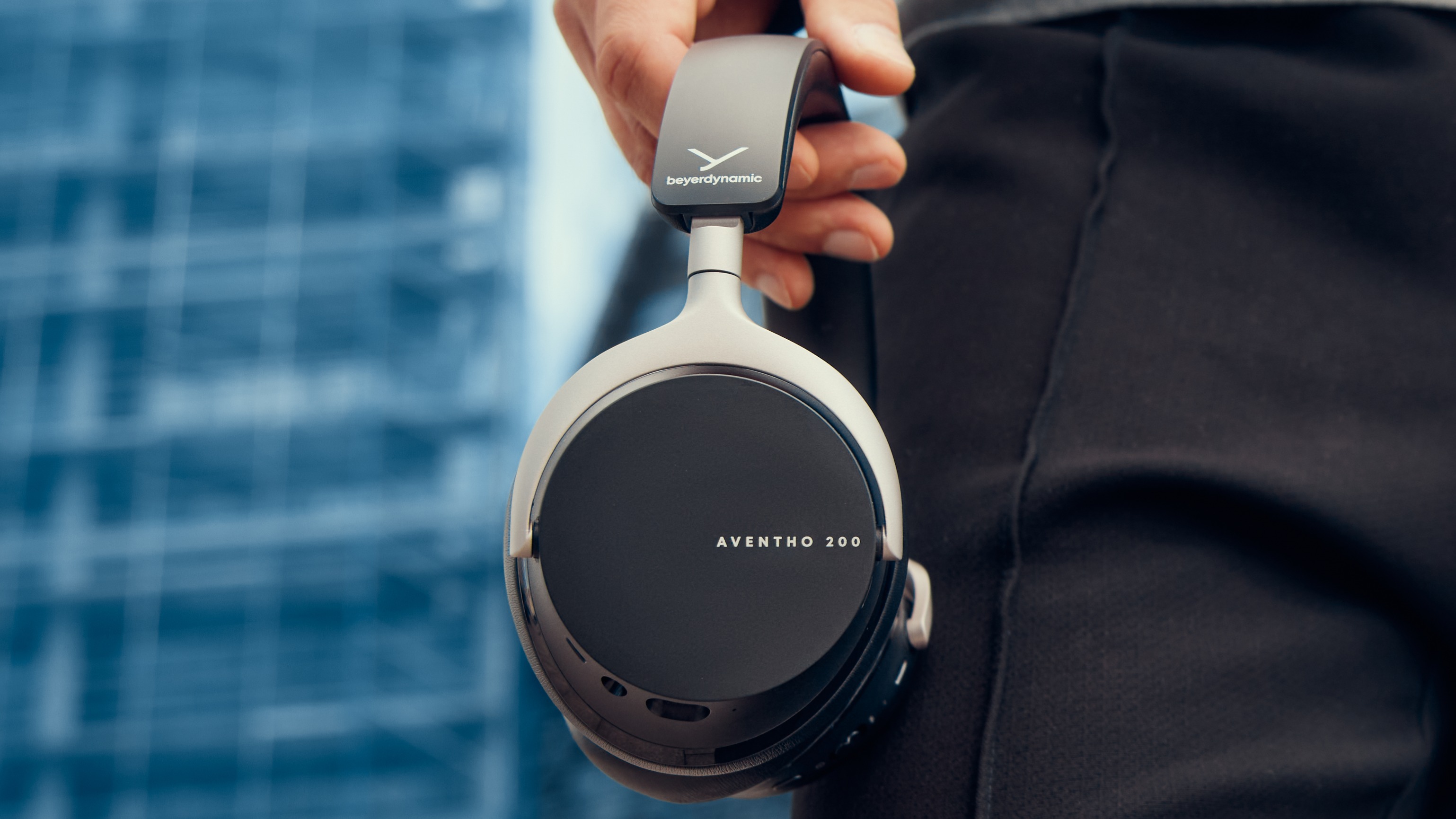 Beyerdynamic Aventho 200 headphones in black held in the hand