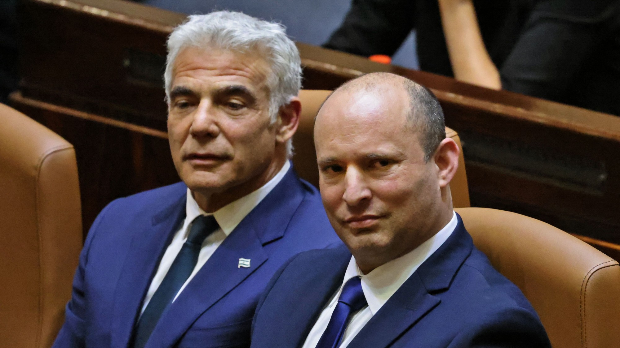 The hardline right-winger Naftali Bennett and the centrist Yair Lapid have announced they will be merging their two parties to form a single party