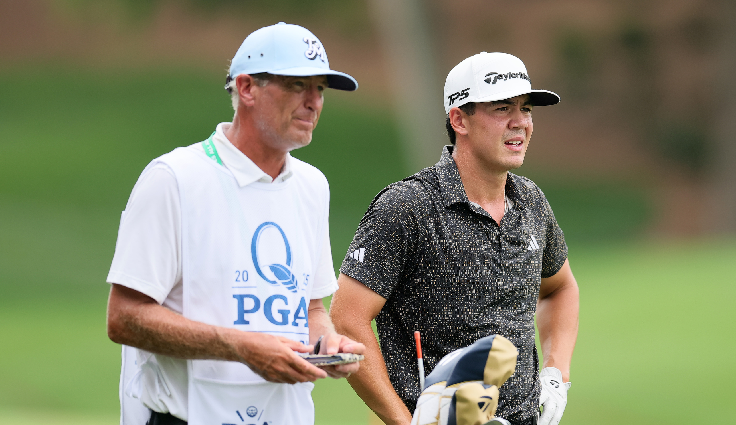 Lance Bennett and Michael Thorbjornsen chat at the PGA Championship