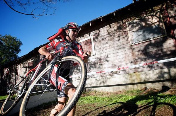 Andy Jacques-Maynes (Bissell Pro Cycling) runs the barriers.