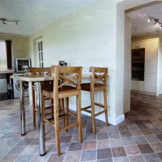 kitchen room with dining table and chairs