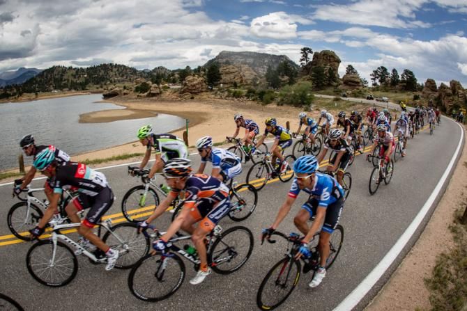 The group winds its way through Estes Park.