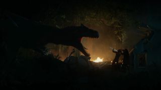 An Allosaurus faces off against André Holland and Natalie Martinez in Battle At Big Rock.