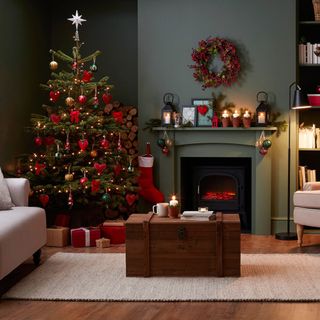 living room with wooden floor and grey wall with chirstmas tree
