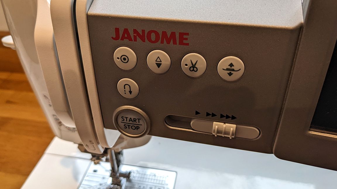 Janome Continental M7 review, a close up of a sewing machine panel