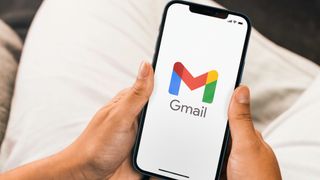 Gmail app on iPhone in woman's hand