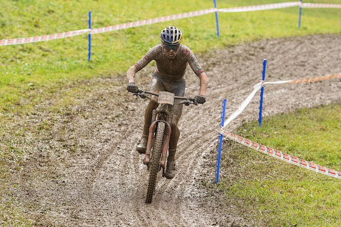 Under all that mud is Great Britain&rsquo;s Tom Pidcock