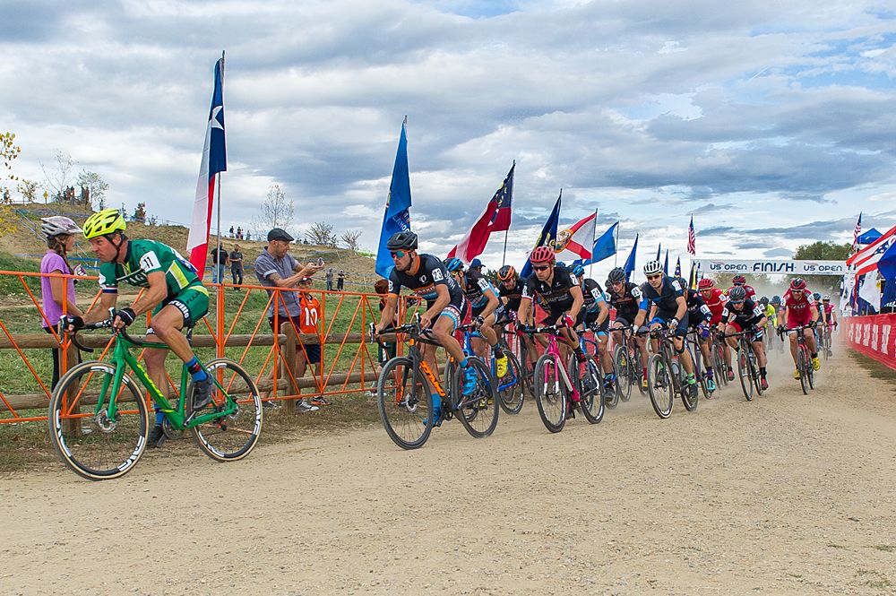 The start of the elite men's race with Jonathan Page (Page | Fuji) going for the hole shot.