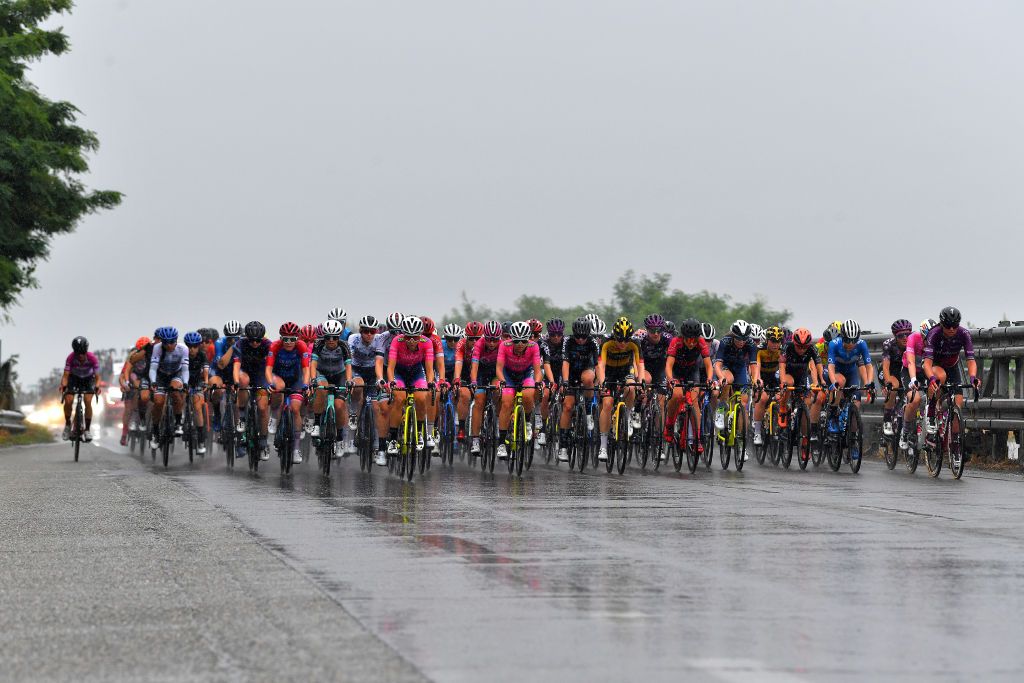 OVADA ITALY JULY 04 The peloton during the 32nd Giro dItalia Internazionale Femminile 2021 Stage 3 a 135km stage from Casale Monferrato to Ovada Rain Landscape GiroDonne UCIWWT on July 04 2021 in Ovada Italy Photo by Luc ClaessenGetty Images