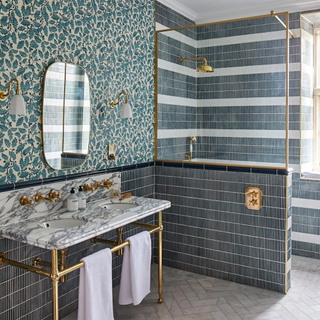 Ca Pietra bathroom with wallpaper and tiles