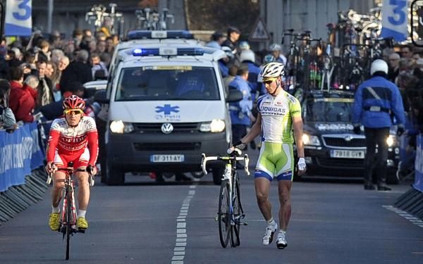 Peter Sagan (Liquigas-Cannondale) walks his bike to the line after crashing on stage 3 of Paris-Nice