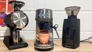 a photo of the mazzer philos, sage/breville bamino, and baratza encore esp pro in a kitchen