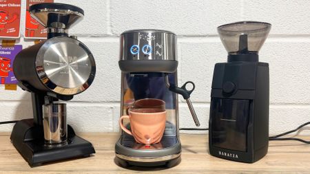 a photo of the mazzer philos, sage/breville bamino, and baratza encore esp pro in a kitchen 