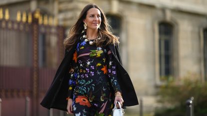 woman in dark floral dress