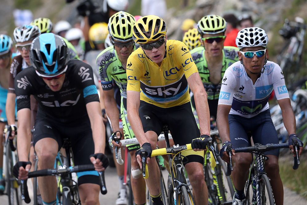 Chris Froome rides in the GC group during stage 19.