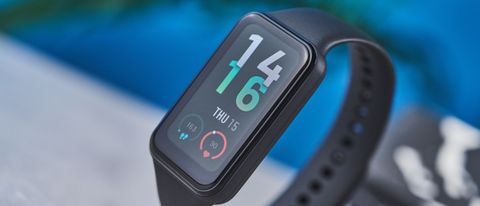 a small fitness tracker with a smooth touchscreen and TPU strap and a bright, vibrant screen showing activity types and a heart rate monitor on the underside