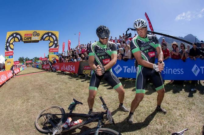 Riders celebrate an emotional finish