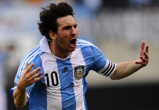 Lionel Messi celebrates after scoring a hat-trick for Argentina against Brazil in a 4-3 win in 2012.