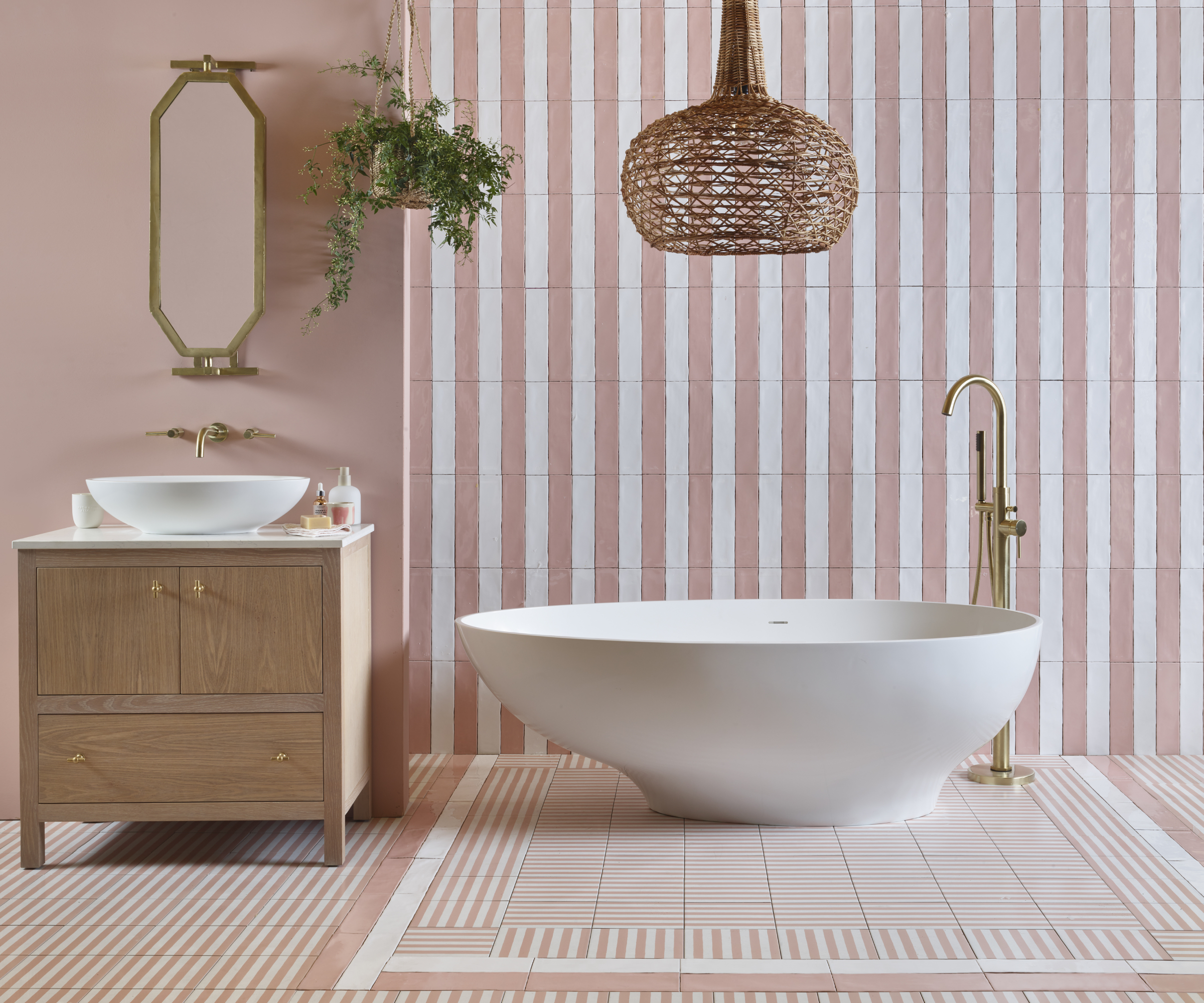white and pink bathroom with freestanding bath