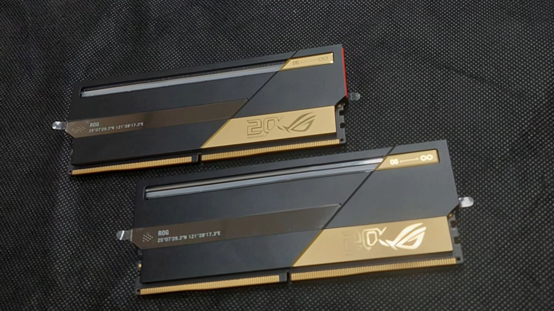 Two sticks of Asus ROG Edition 20 RAM shown lying on a surface