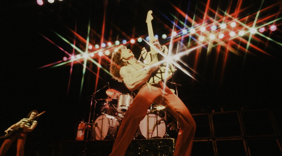(far left) Michael Anthony and Eddie Van Halen perform with Van Halen at the Kouseinennkinn-kaikan in Tokyo in June 1978