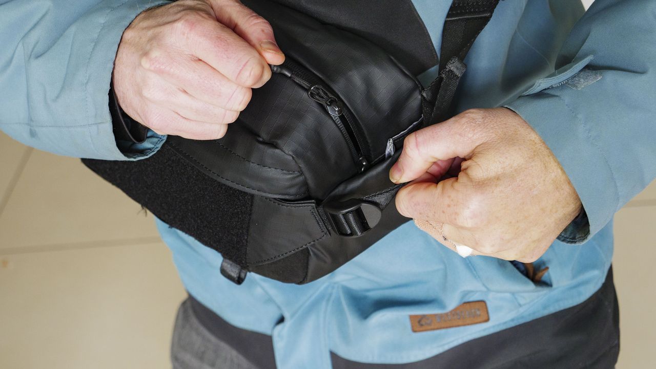 Close up of the Ulanzi Camera Sling Bag with its zip being opened