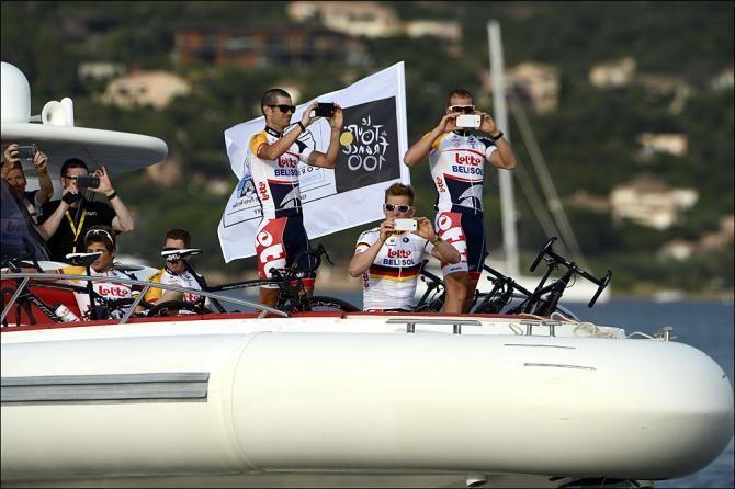 Lotto riders photograph the photographers on their way to the presentation