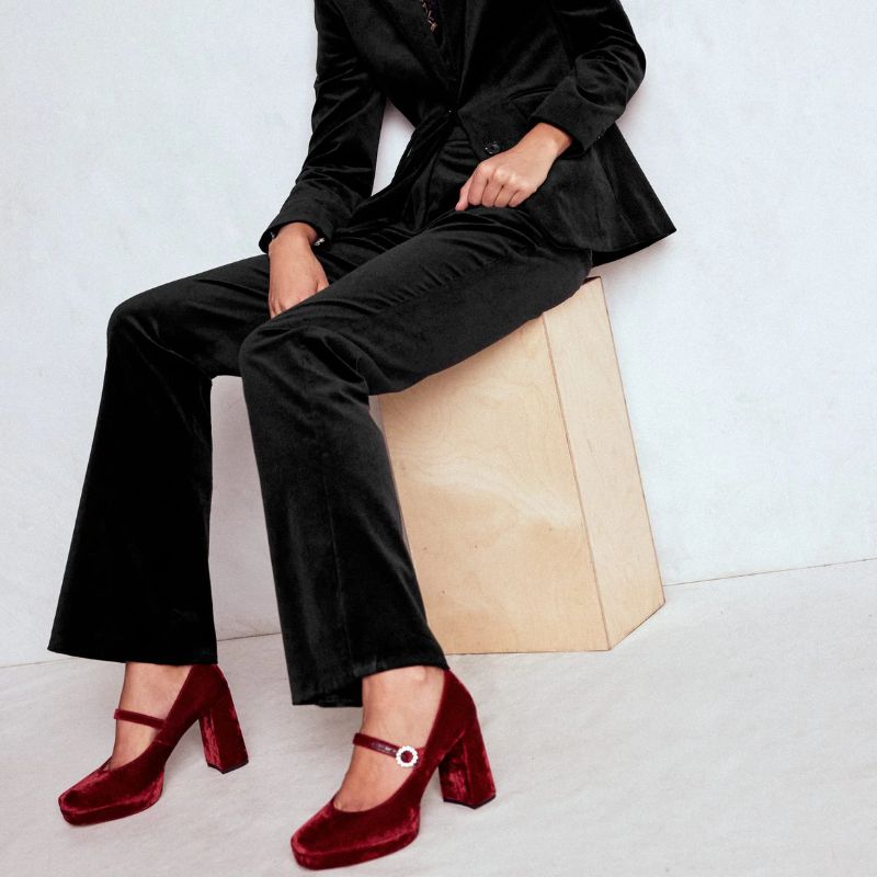 Fitted Velvet Flare Trousers on model 
