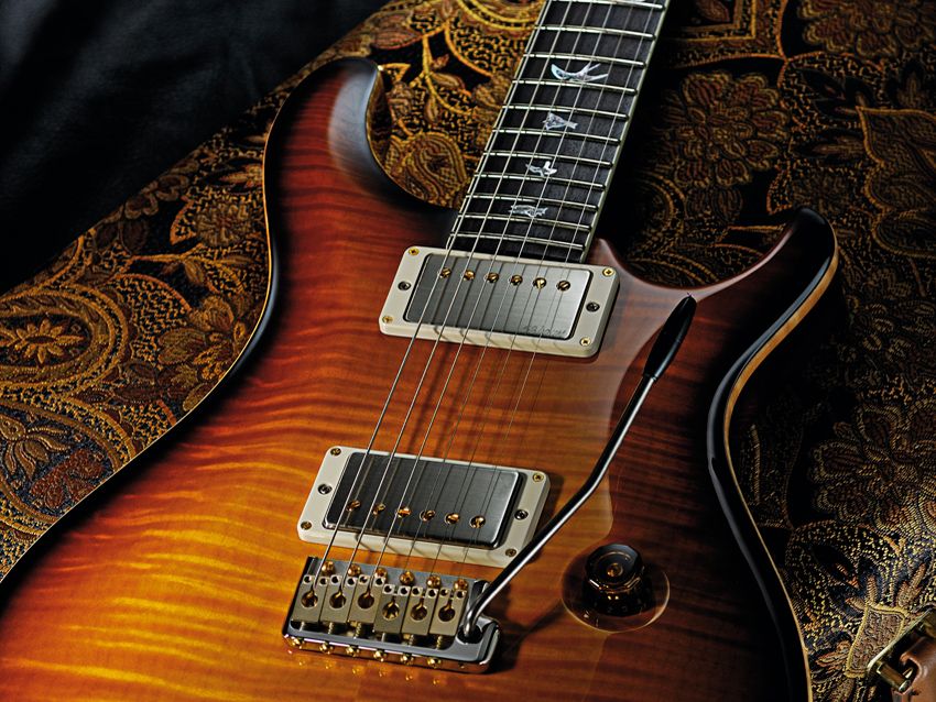 The body boasts a gorgeous flamed maple top.