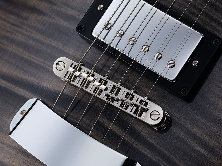 The six-saddle bridge is a dependable tune-o-matic-style unit