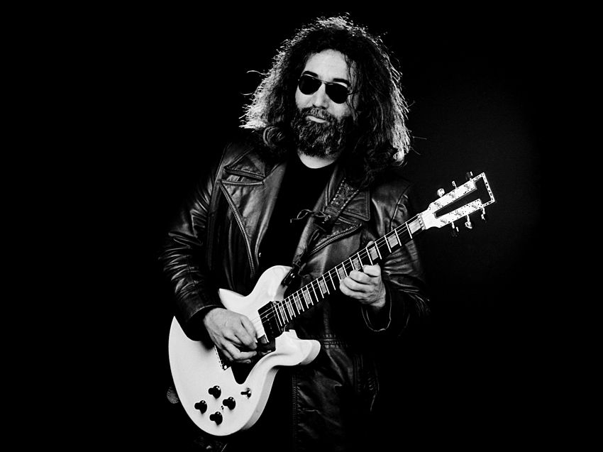 Jerry Garcia of The Grateful Dead with a Travis Bean TB1000A Artist electric guitar in 1981