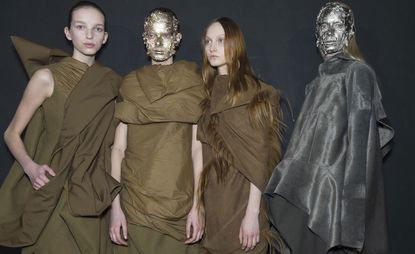 4 Female models dressed Rick Owens A/W 2015 collection backstage of the fashion show