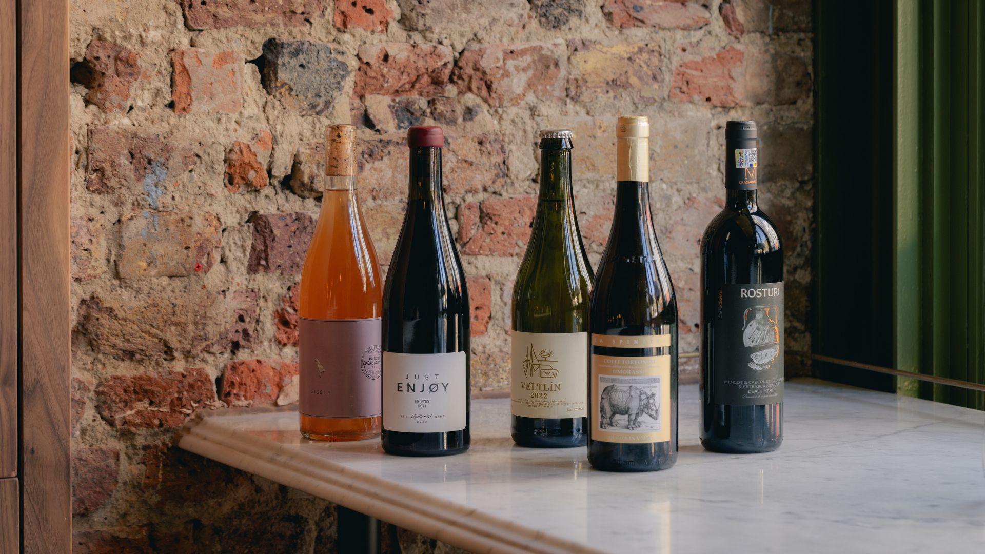 an image of five of the bottles sold by the glass at sova