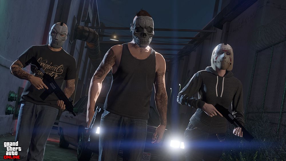 A screenshot from Grand Theft Auto online, of three characters in masks holding guns walking across a bridge at night