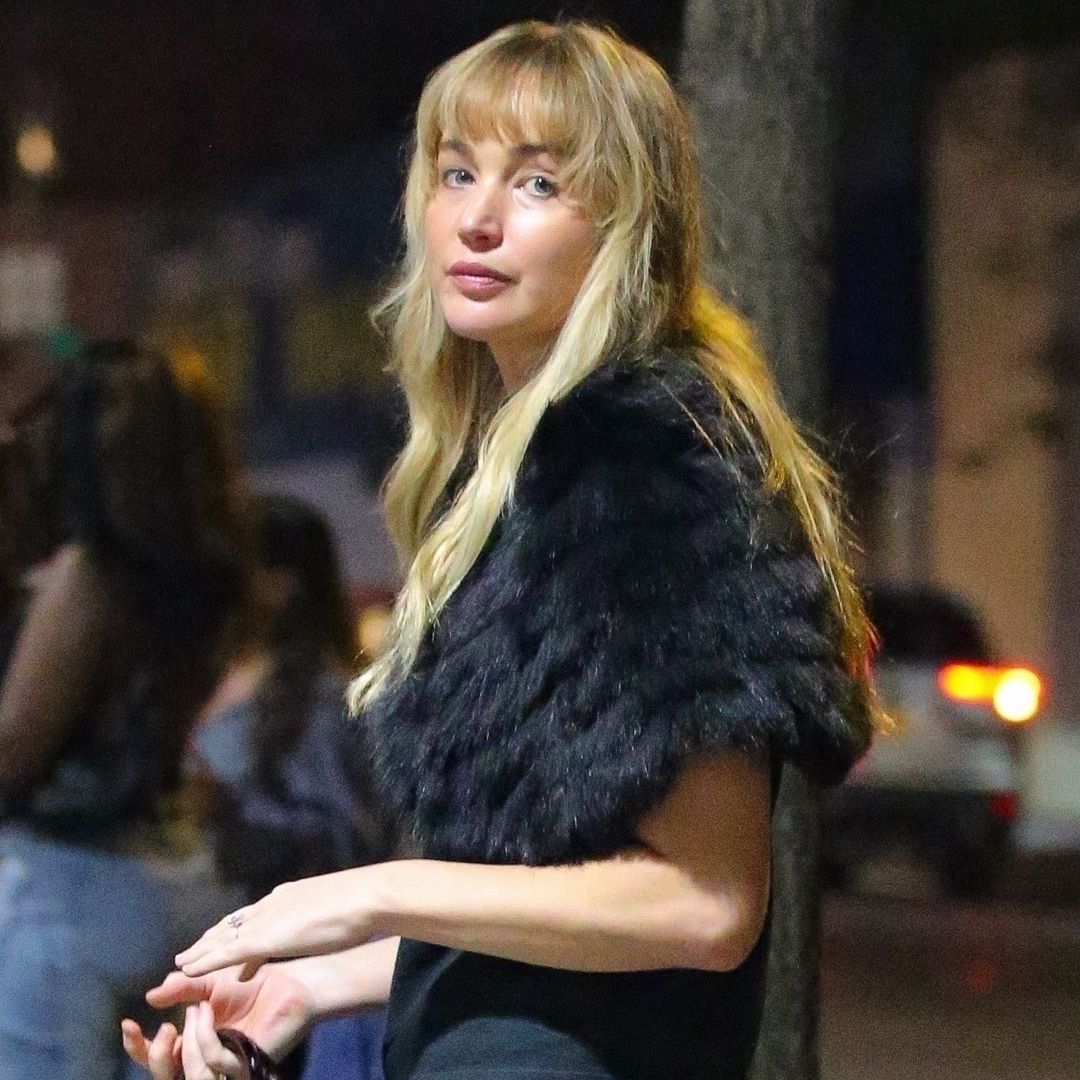 Jennifer Lawrence wore a fur shawl over her shoulders with La Ligne jeans and a five-figure The Row bag