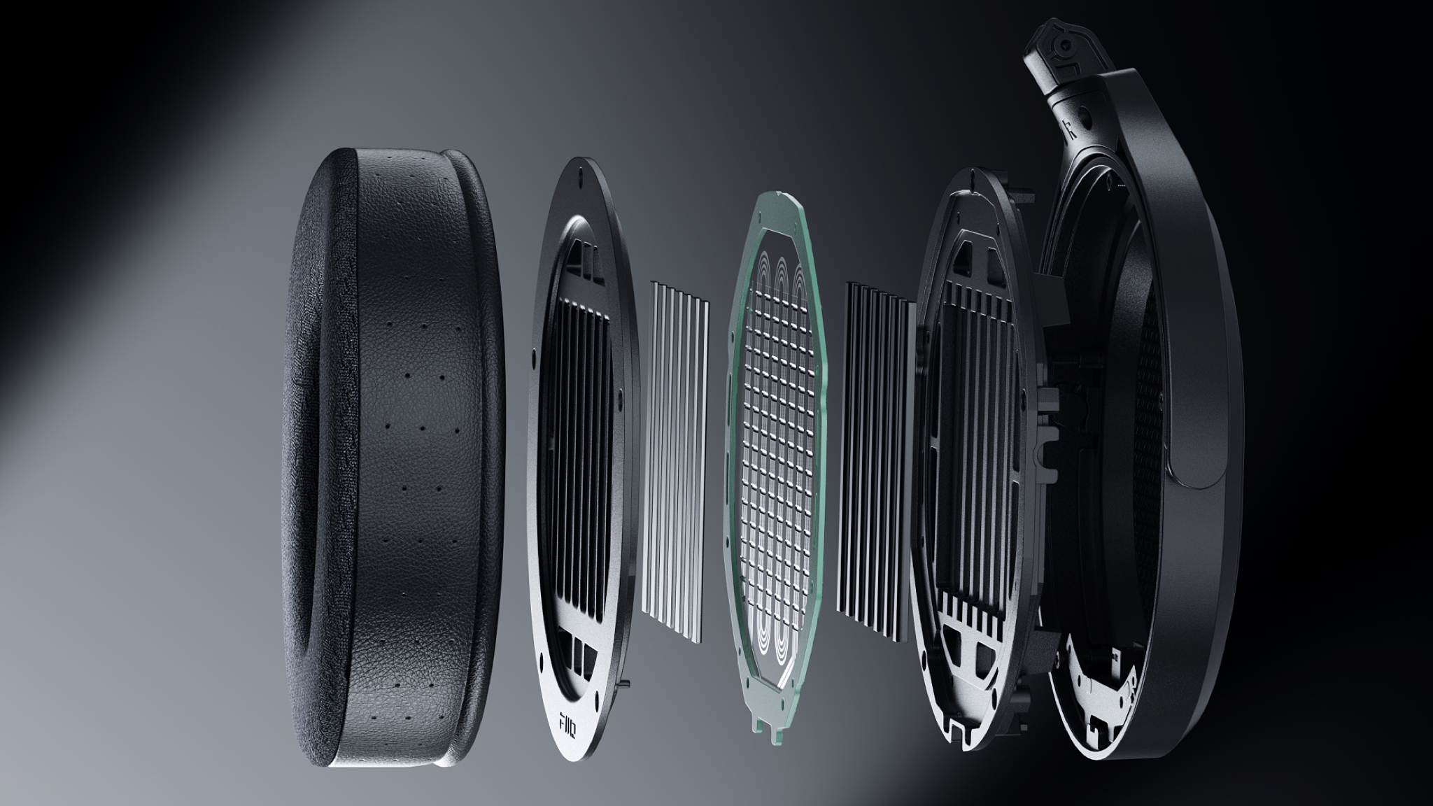 Exploded view of the FiiO JT7 headphone drivers on a gradient grey background