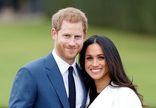 Prince Harry and Meghan Markle attend an official photocall to announce their engagement at The Sunken Gardens, Kensington Palace on November 27, 2017 in London, England. Prince Harry and Meghan Markle have been a couple officially since November 2016 and are due to marry in Spring 2018.