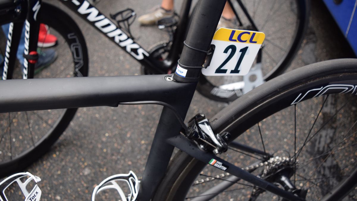 A wedge based seat clamp for the D profile seat post