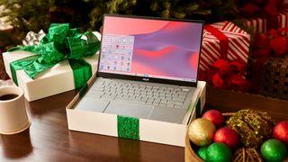 Asus Chromebook in a Christmas box with Christmas decorations