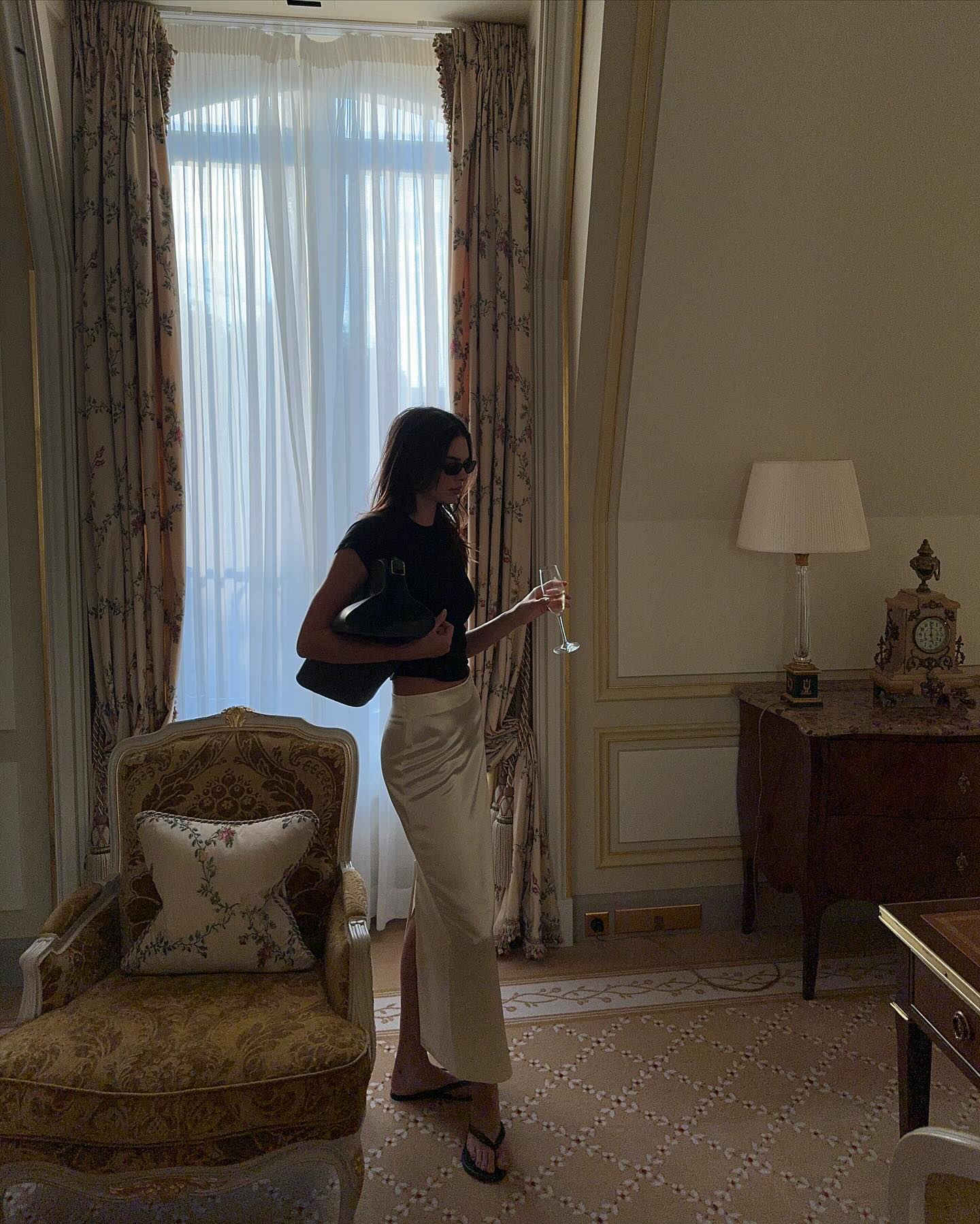Kendall Jenner wearing flip flops.