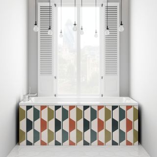 colourful geometric panelling in a white bathroom, with shuttered windows in the background