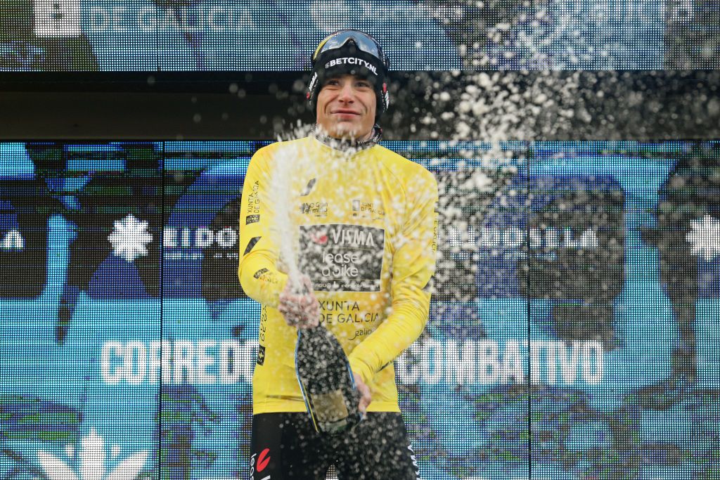 CHANTADA SPAIN FEBRUARY 23 Jonas Vingegaard of Denmark and Team Visma Lease a Bike celebrates at podium as Yellow leader jersey winner during the 3rd O Gran Camio The Historical Route 2024 Stage 2 a 1512km stage from Taboada to Chantada 481m on February 23 2024 in Chantada Spain Photo by Dario BelingheriGetty Images