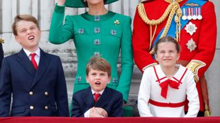 Prince George of Wales, Catherine, Princess of Wales, Prince Louis of Wales, Princess Charlotte of Wales and Prince William, Prince of Wales watch an RAF flypast from the balcony of Buckingham Palace during Trooping the Colour on June 17, 2023 in London, England