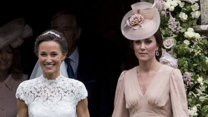 Pippa Middleton and Catherine, Duchess of Cambridge attend the wedding of Pippa Middleton and James Matthews at St Mark's Church on May 20, 2017 in Englefield Green, England.