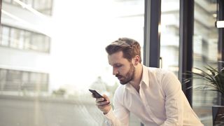 Man speaks to smartphone