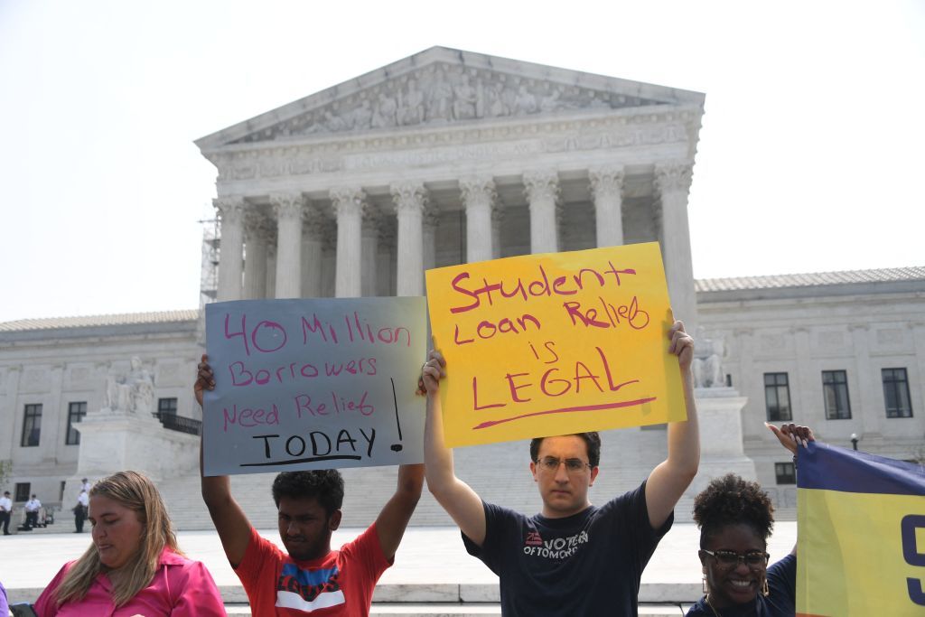 Protesters over student loan debt in front of the Supreme Court 