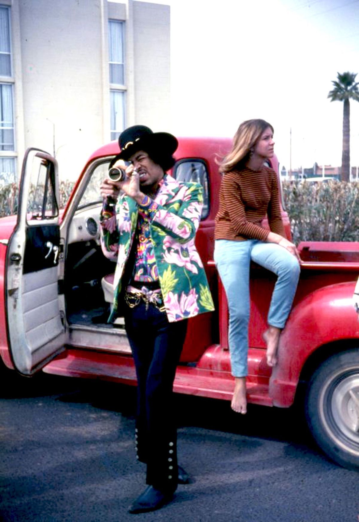 Jimi Hendrix with a Dodge Pick-Up, a vehicle not dissimilar to the one he stole with Neil Young in order to get the pair to Woodstock.