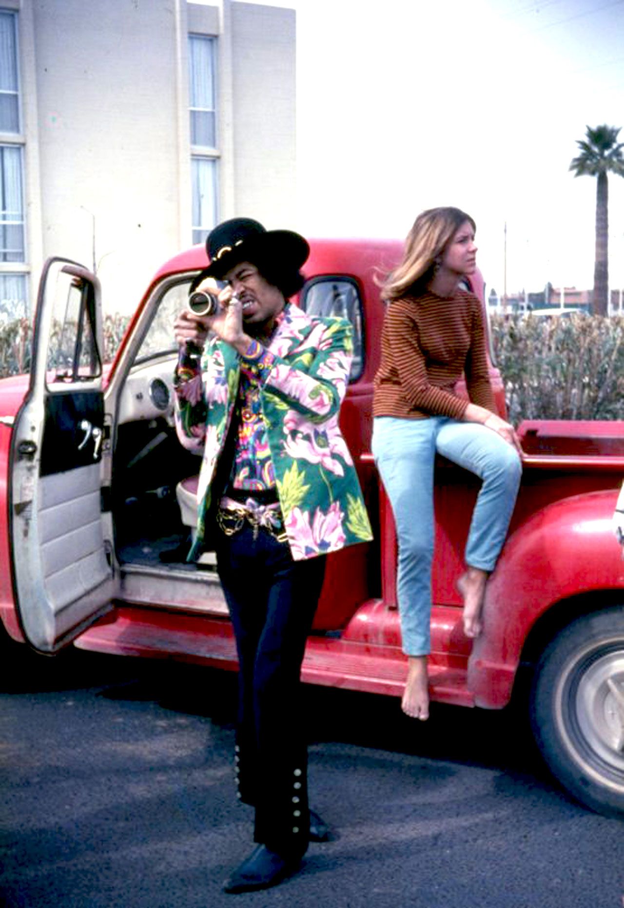 Jimi Hendrix with a Dodge Pick-Up, a vehicle not dissimilar to the one he stole with Neil Young in order to get the pair to Woodstock.